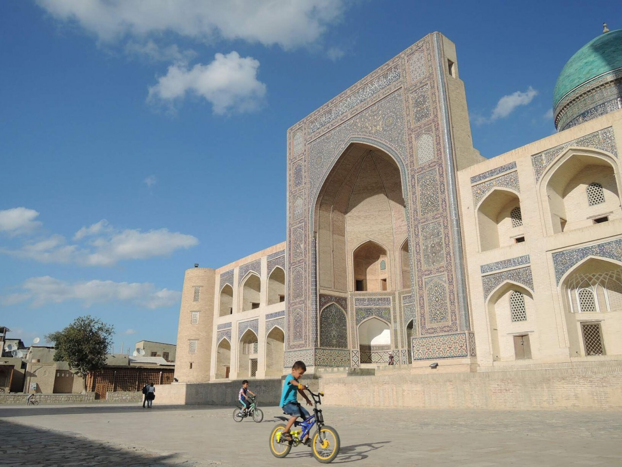 Kids on bycicle in Bukhara